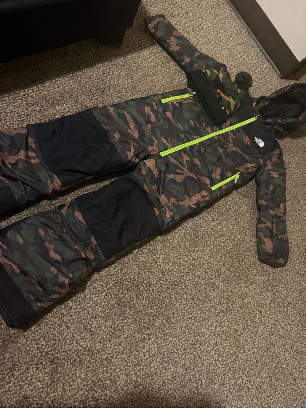 The North Face Kids Camo One-Piece Snowsuit with Neon Green Zippers